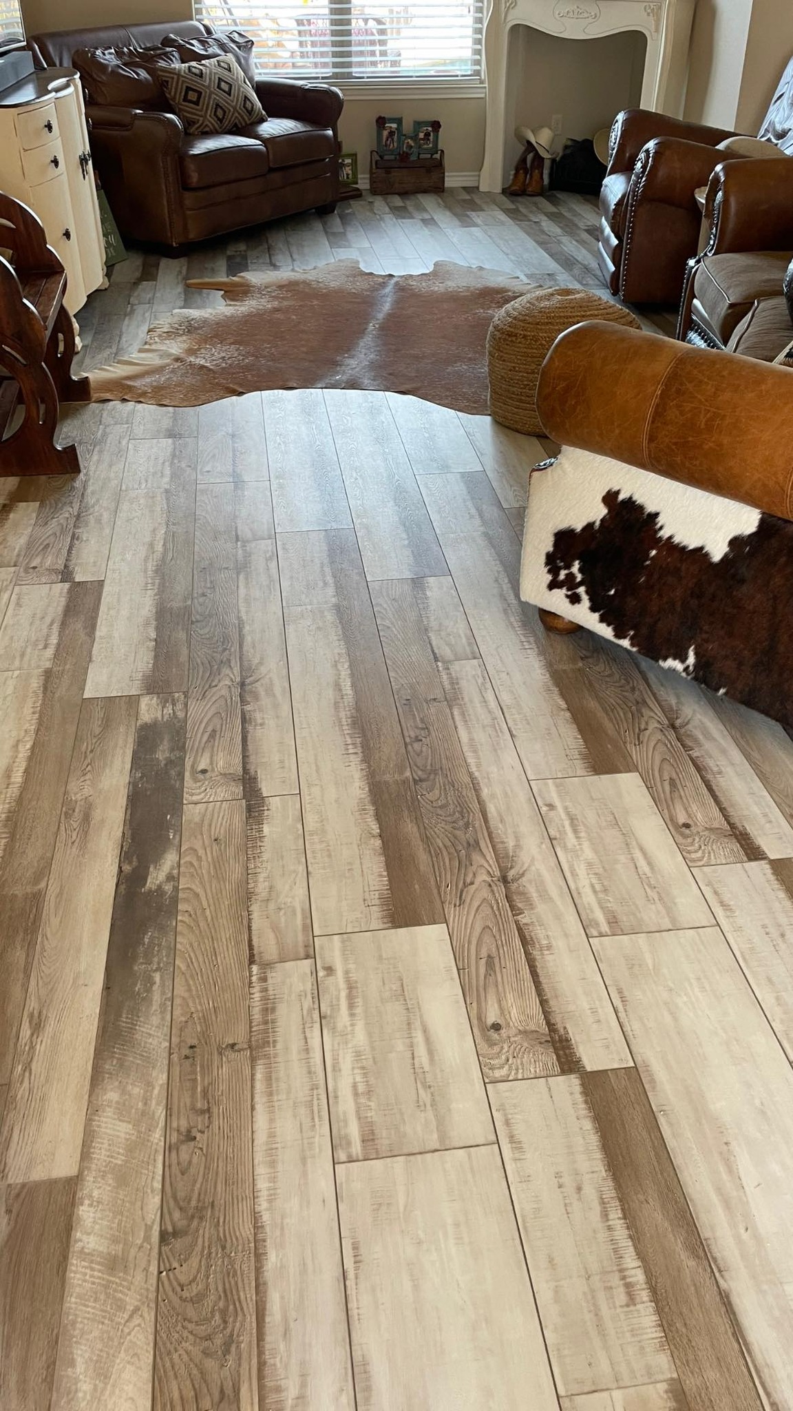 Luxury vinyl plank (LVP) flooring installation in a living room in Brownwood TX — Heart of Texas Flooring project